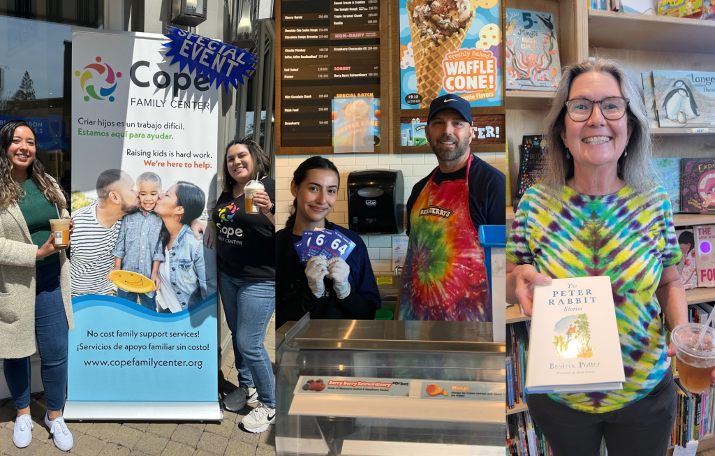 Smiling group of volunteers at a community event beside a COPE Family Center banner; storefront and counter area visible in the background.